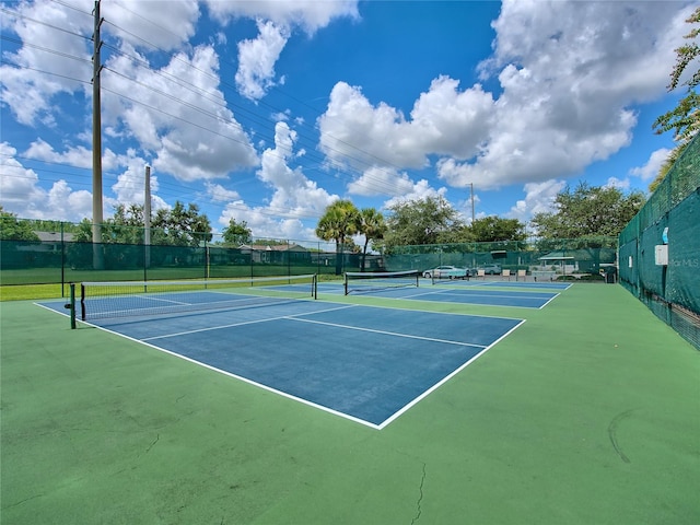 view of sport court with basketball hoop