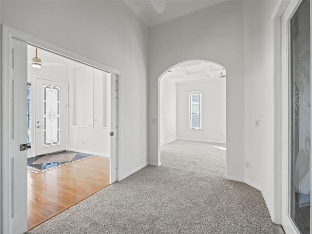 entryway featuring ceiling fan and wood-type flooring