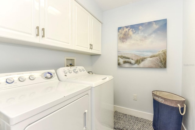 clothes washing area featuring washer hookup, cabinets, washer and dryer, and light tile flooring