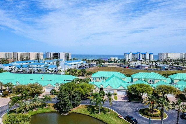 drone / aerial view with a water view