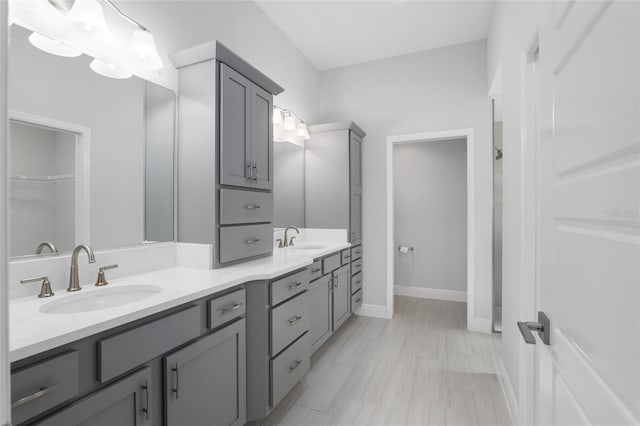 bathroom featuring double sink vanity and tile patterned floors