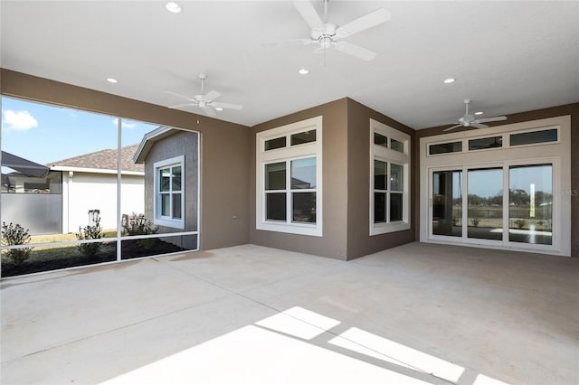 view of patio / terrace featuring ceiling fan