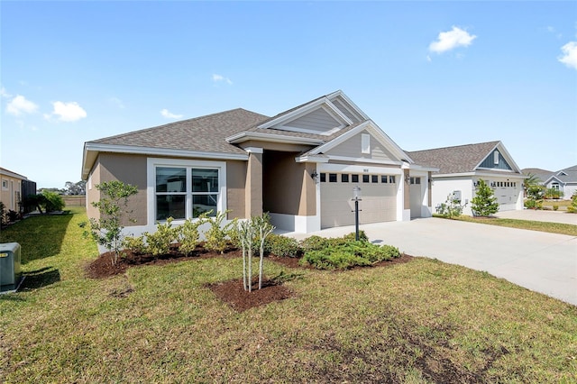 view of front facade with a garage and a front yard