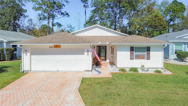 single story home with a front lawn and a garage