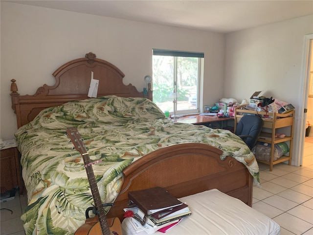 bedroom featuring light tile flooring