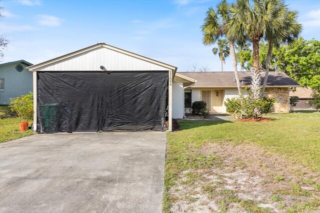 ranch-style home with a front lawn and a carport