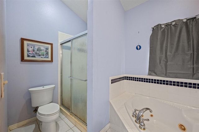 bathroom featuring tile flooring, toilet, and separate shower and tub