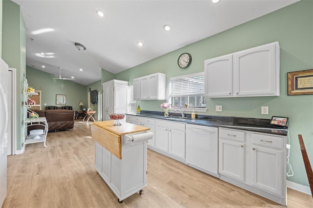 kitchen featuring white cabinets, white dishwasher, light hardwood / wood-style floors, and ceiling fan