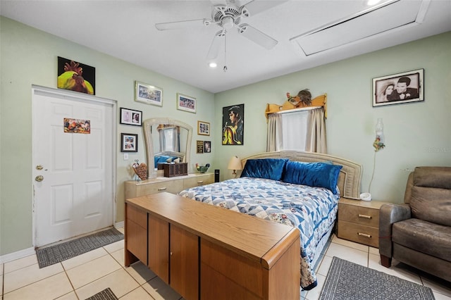 tiled bedroom featuring ceiling fan