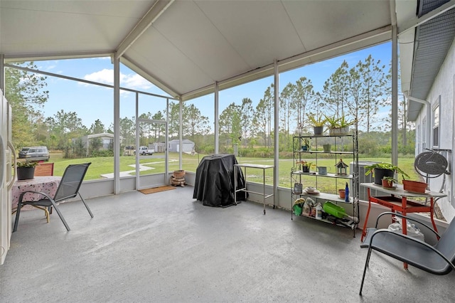 sunroom with vaulted ceiling