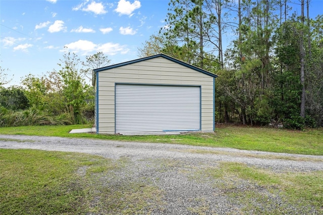 garage with a yard