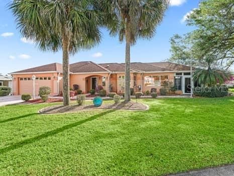 exterior space featuring a front yard and a garage