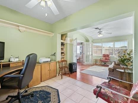 tiled office with ceiling fan