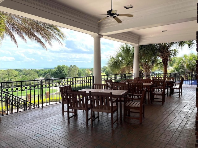 view of patio featuring ceiling fan