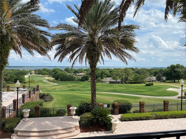 view of nearby features with a lawn and a water view