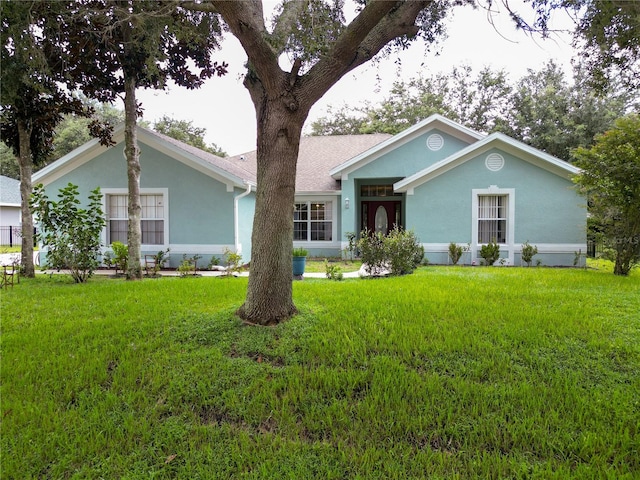 view of front facade with a front lawn