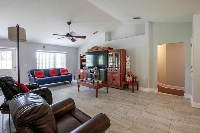 living room with lofted ceiling and ceiling fan