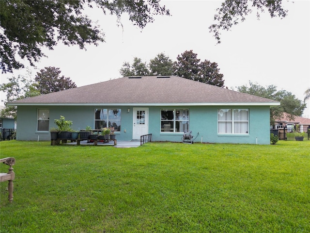 view of front facade with a front yard and outdoor lounge area