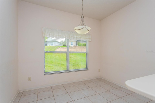 spare room with light tile patterned flooring