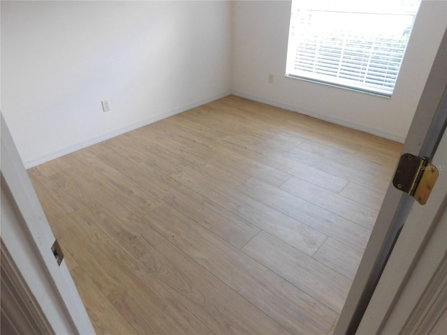 empty room featuring light wood-type flooring