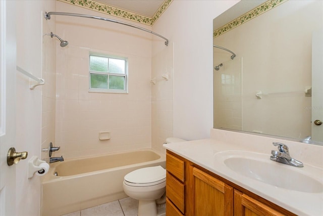 full bathroom featuring tile patterned flooring, vanity, tub / shower combination, and toilet