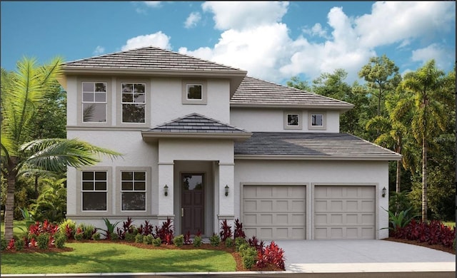 view of front of house featuring a front lawn and a garage