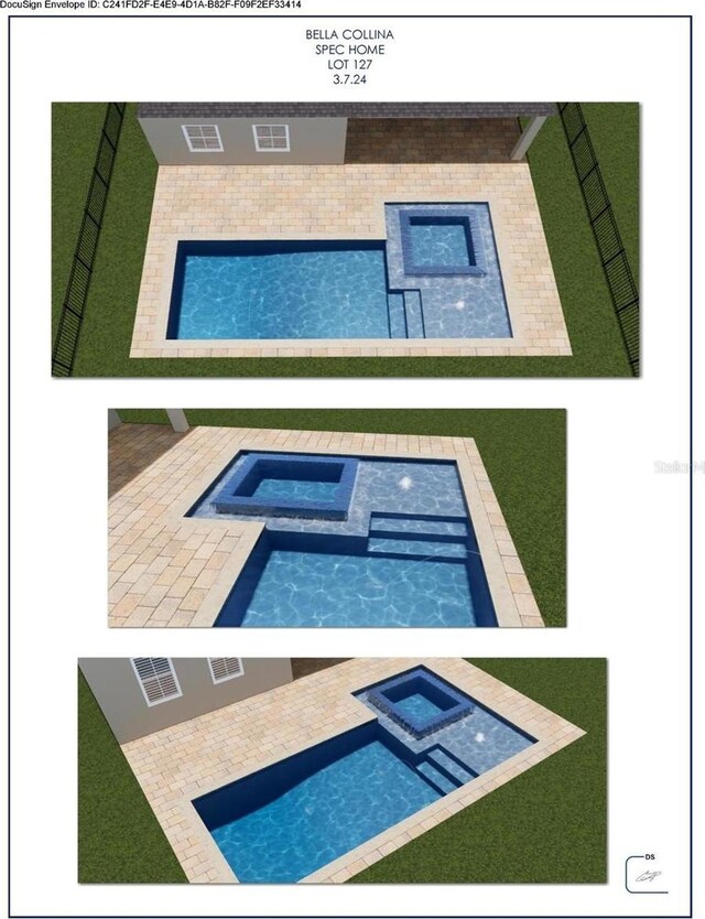 view of swimming pool with an in ground hot tub