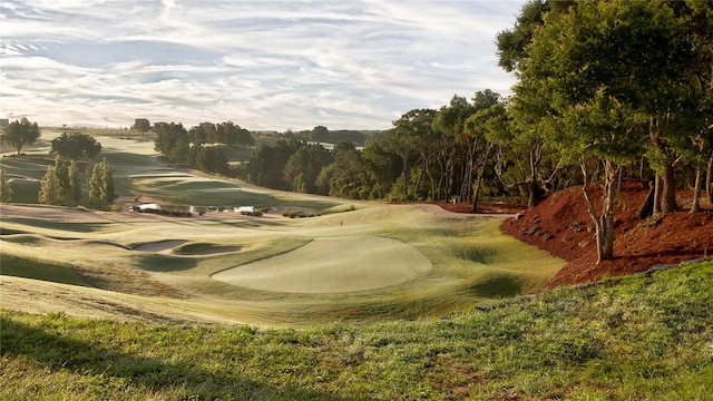 view of community featuring view of golf course