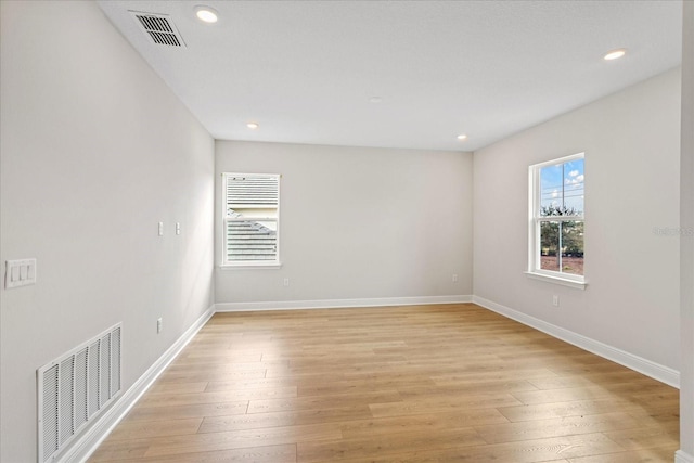 empty room featuring light hardwood / wood-style floors