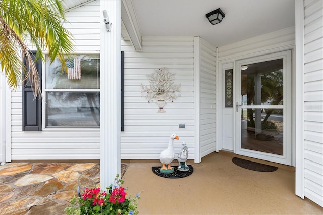 entrance to property with covered porch