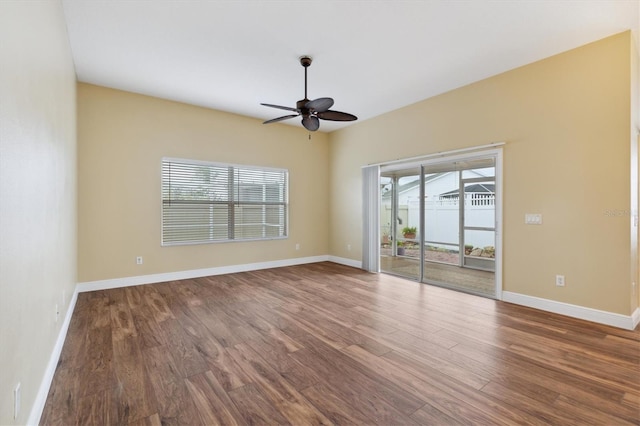 spare room with ceiling fan and wood-type flooring