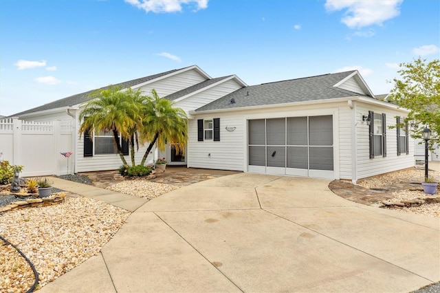 ranch-style home featuring a garage