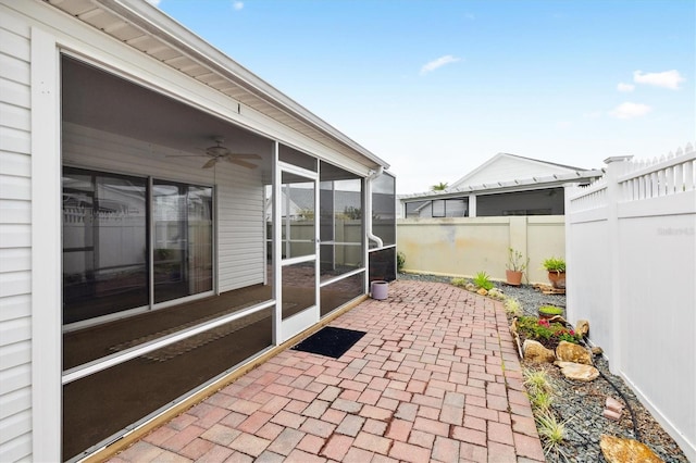 view of patio with a sunroom