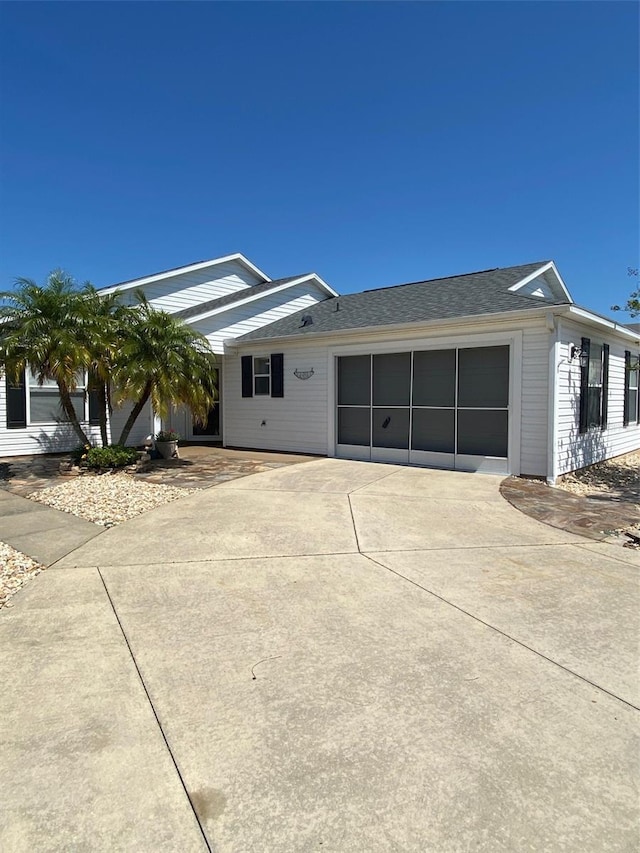 ranch-style home with a garage