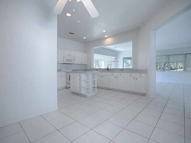 kitchen with white cabinetry, ceiling fan, light tile flooring, white appliances, and sink