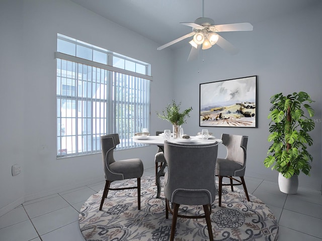 tiled dining room with ceiling fan and a wealth of natural light