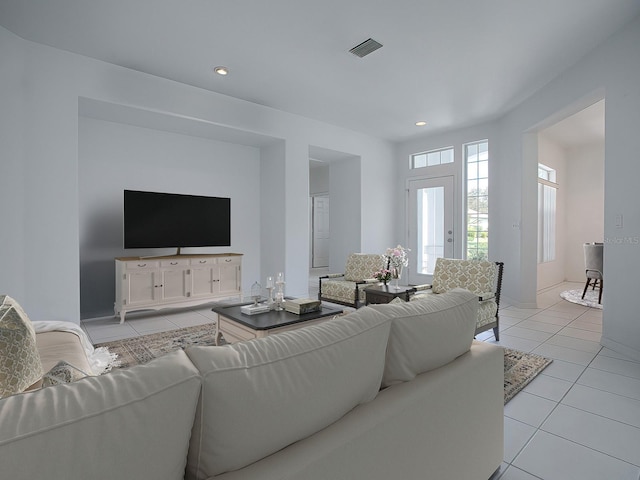 living room with light tile flooring