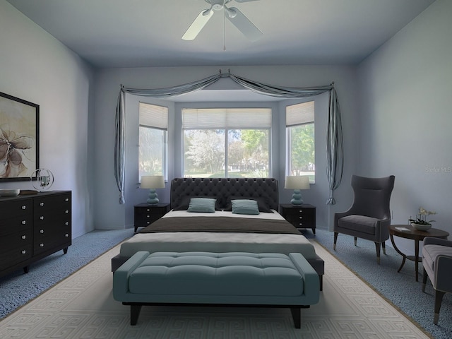 carpeted bedroom featuring ceiling fan