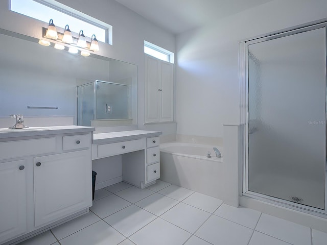 bathroom featuring independent shower and bath, tile flooring, and vanity