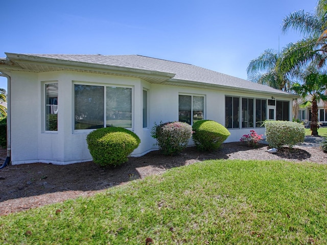 exterior space featuring a front lawn