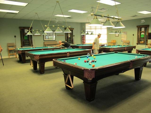 playroom with billiards, light colored carpet, and a paneled ceiling