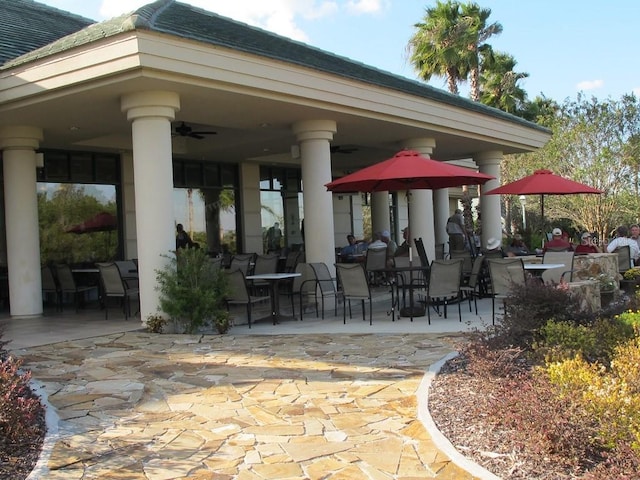 view of terrace featuring ceiling fan