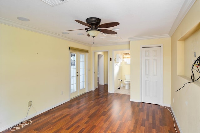 unfurnished bedroom with ceiling fan, french doors, dark hardwood / wood-style flooring, a closet, and ornamental molding