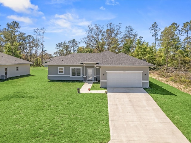 ranch-style house featuring a front lawn and a garage