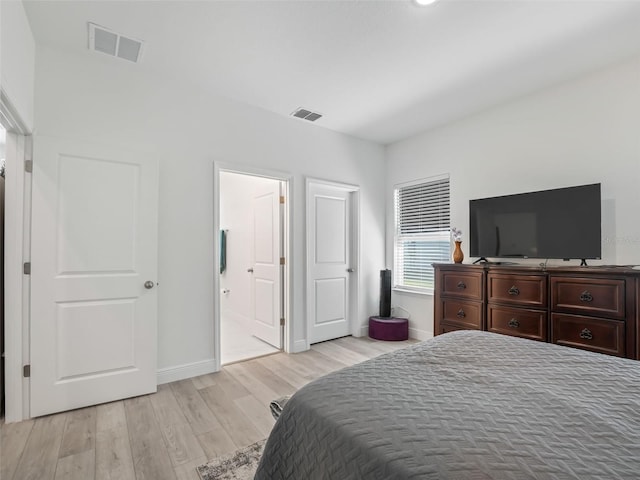 bedroom featuring light hardwood / wood-style floors