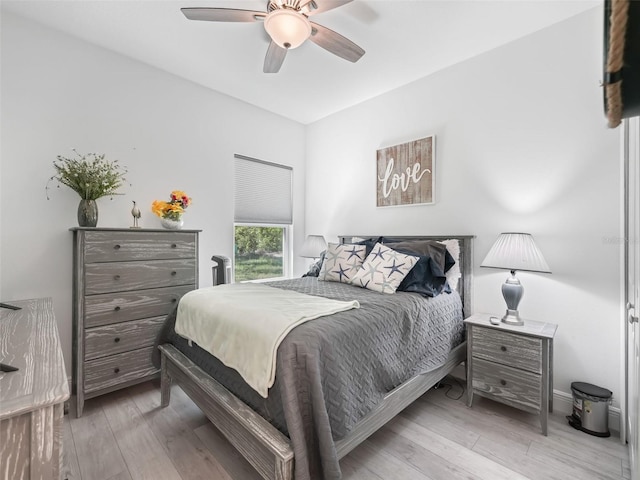 bedroom featuring ceiling fan and light wood-type flooring