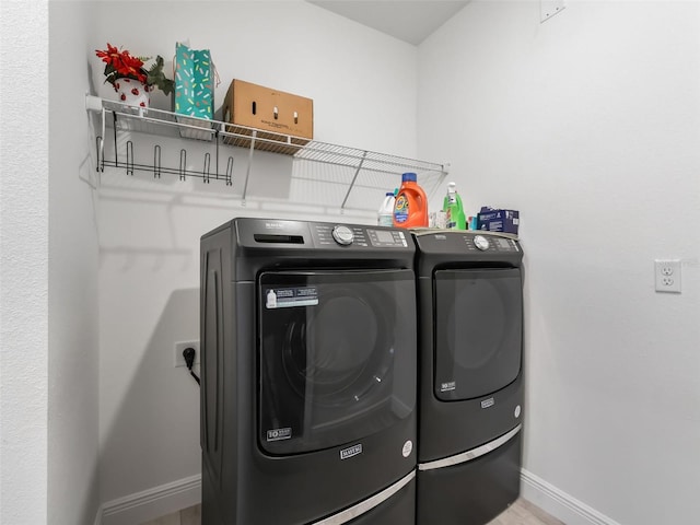 laundry area featuring washing machine and dryer