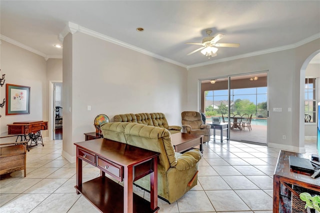 living room featuring ceiling fan, light tile patterned flooring, and crown molding