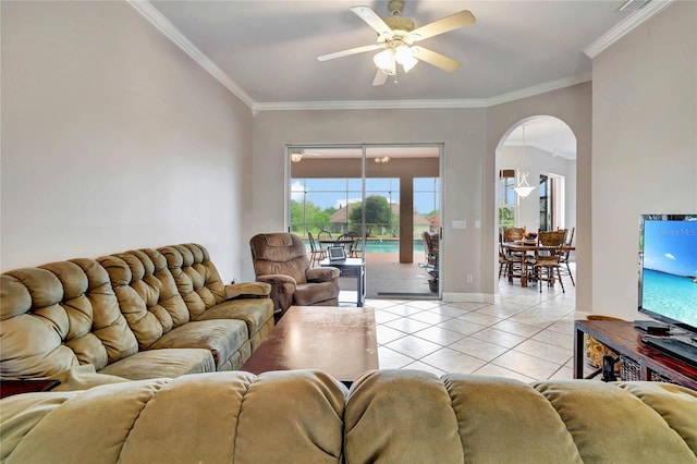 living room with ceiling fan, crown molding, and light tile patterned floors