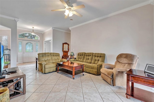 living room with crown molding, light tile patterned floors, and ceiling fan